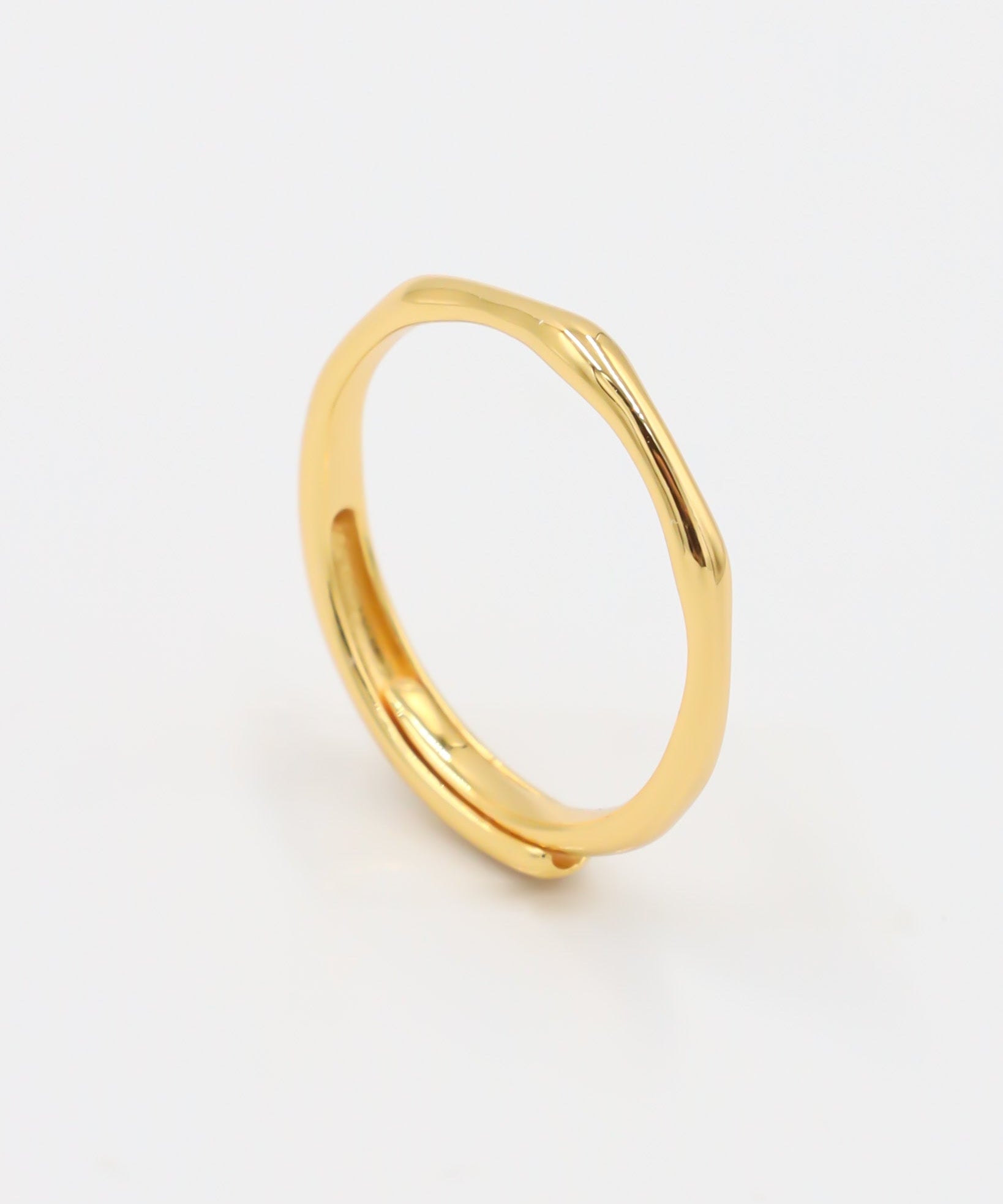 Lisanne - adjustable gold-plated sterling silver ring, minimalist design, side view.