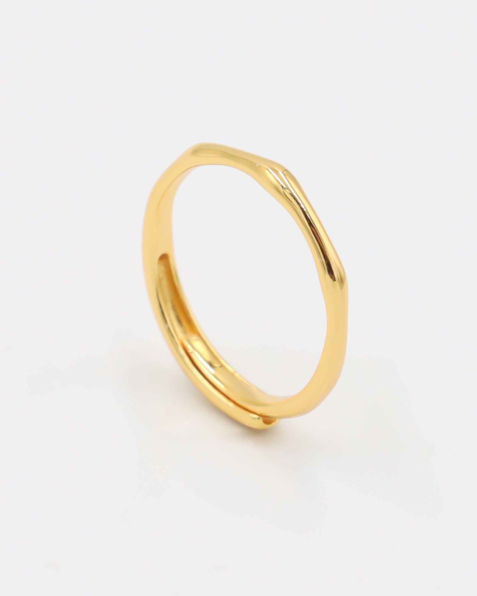 Lisanne - adjustable gold-plated sterling silver ring, minimalist design, side view.