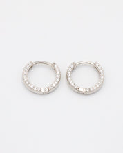 Elegant Mara sterling silver hoop earrings encrusted with shimmering zirconia stones, a versatile and timeless staple.