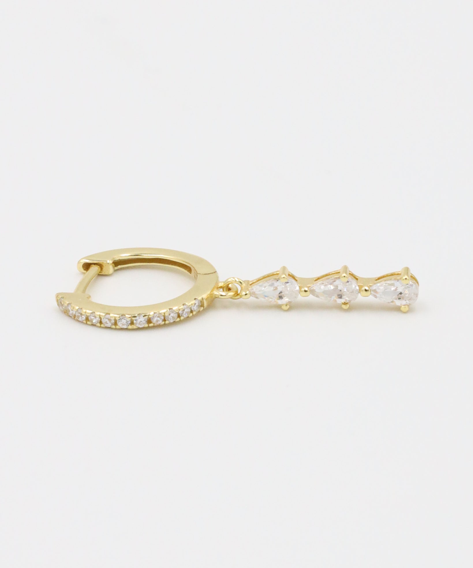 Single Micah gold drop earring showcasing teardrop-shaped zirconia stones and pavé hoop, gold-plated sterling silver.