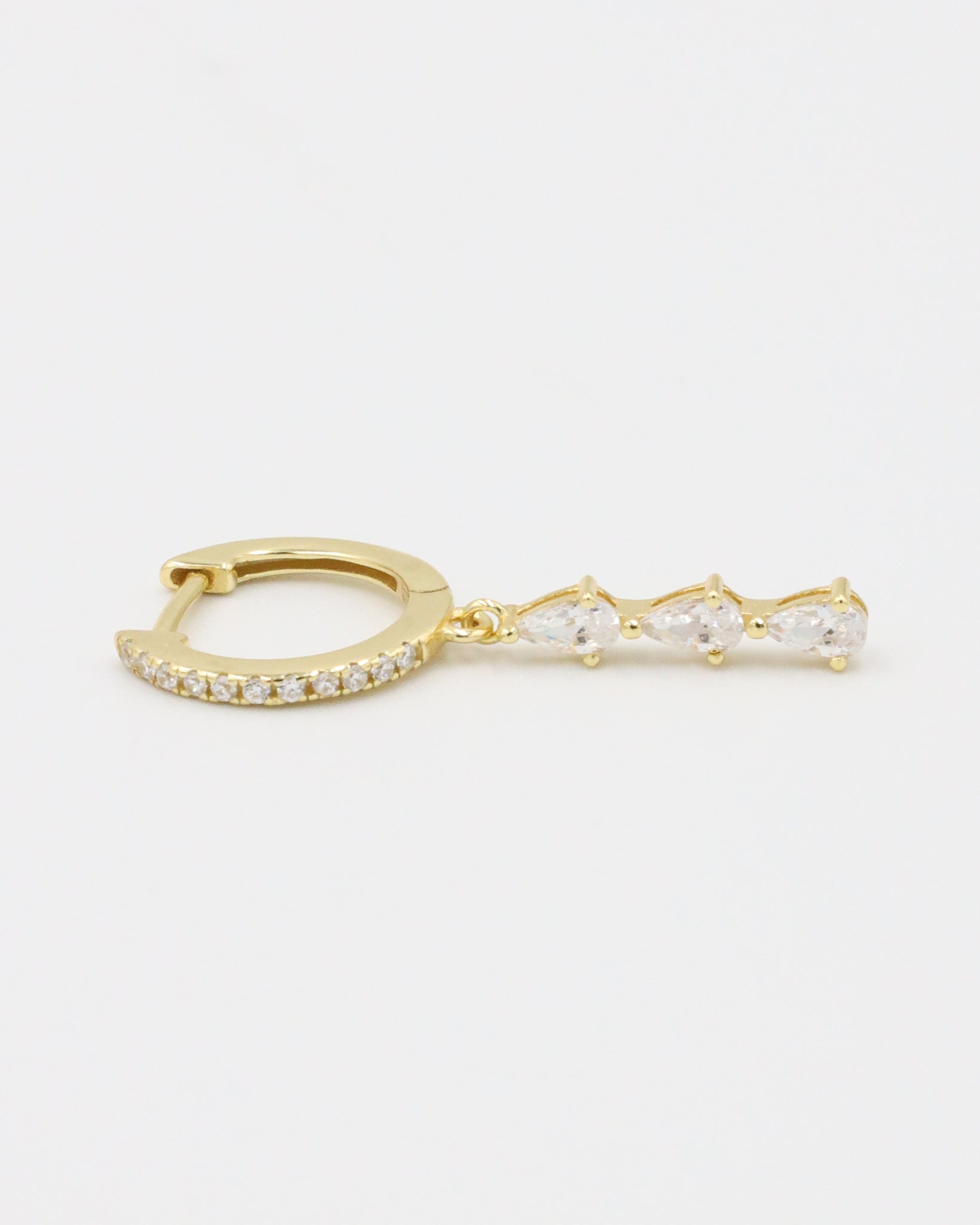 Single Micah gold drop earring showcasing teardrop-shaped zirconia stones and pavé hoop, gold-plated sterling silver.