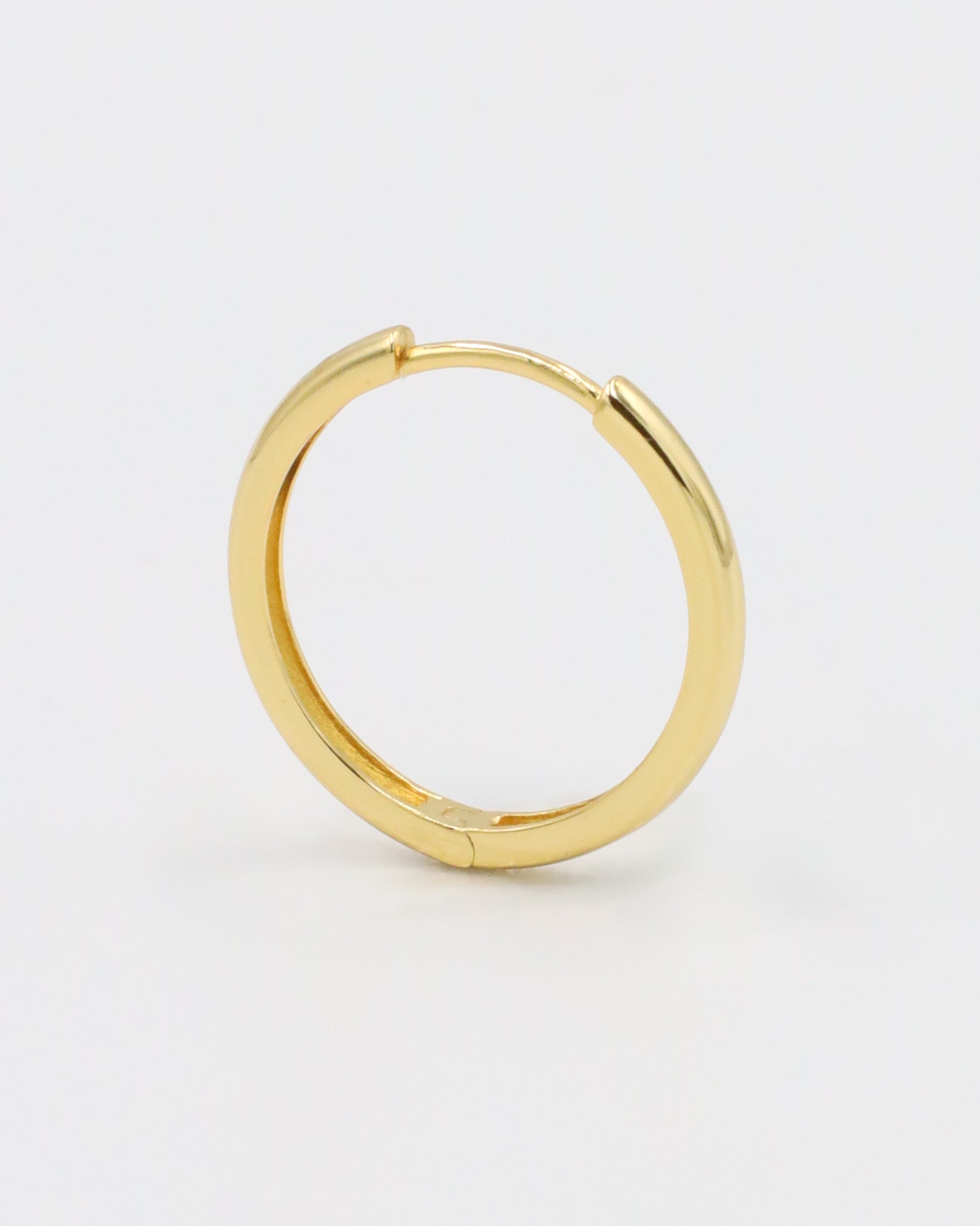 Rachele hoop earring front view, crafted from gold-plated sterling silver with a smooth finish.