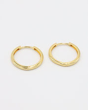 Single Rachele hoop earring in gold-plated sterling silver, showcasing a sleek, minimalist design.