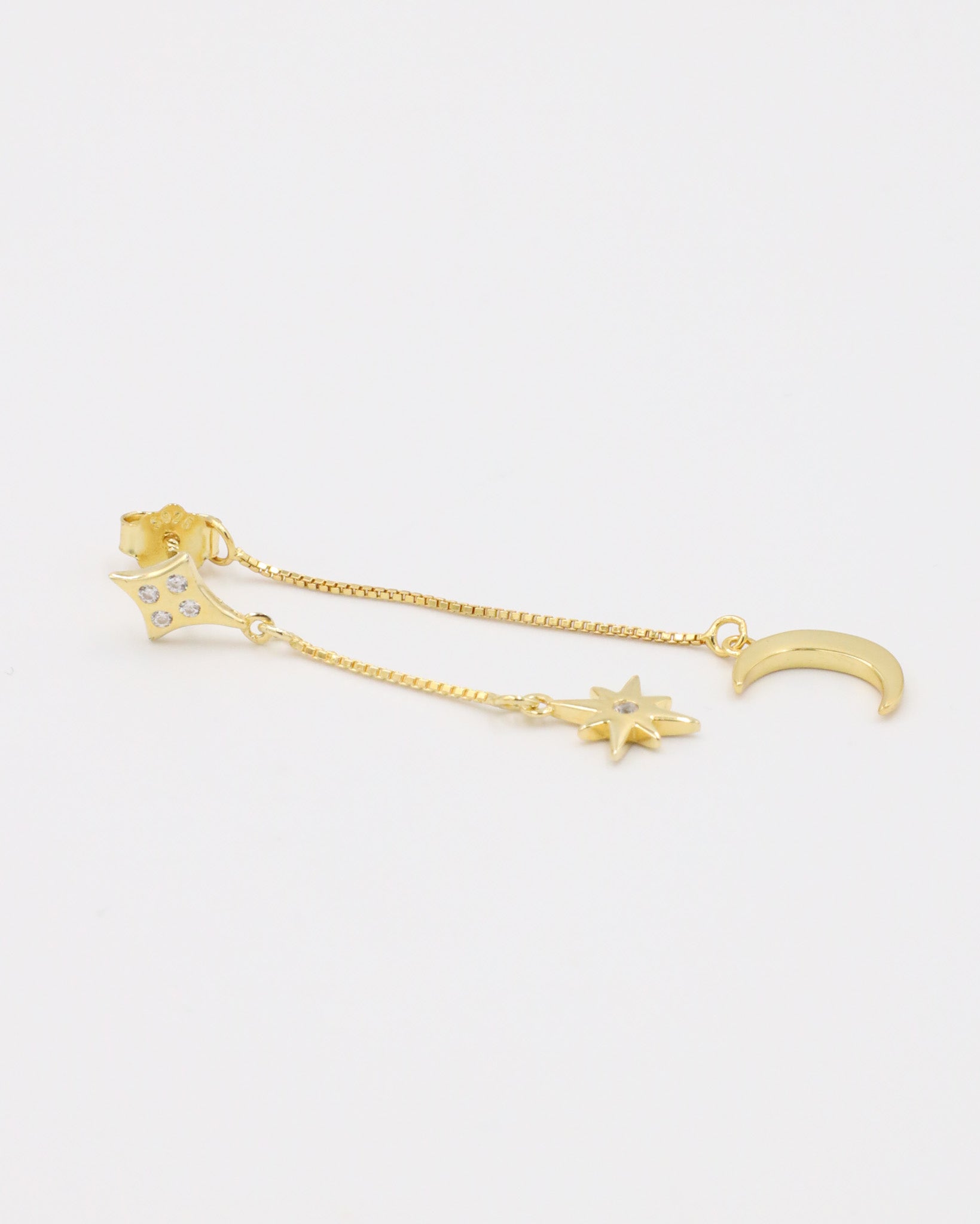 Single Reese earring in gold-plated sterling silver, featuring a delicate chain with a crescent moon and star detail