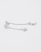 Single Reese silver earring with a crescent moon charm, hanging from a fine chain in sterling silver.