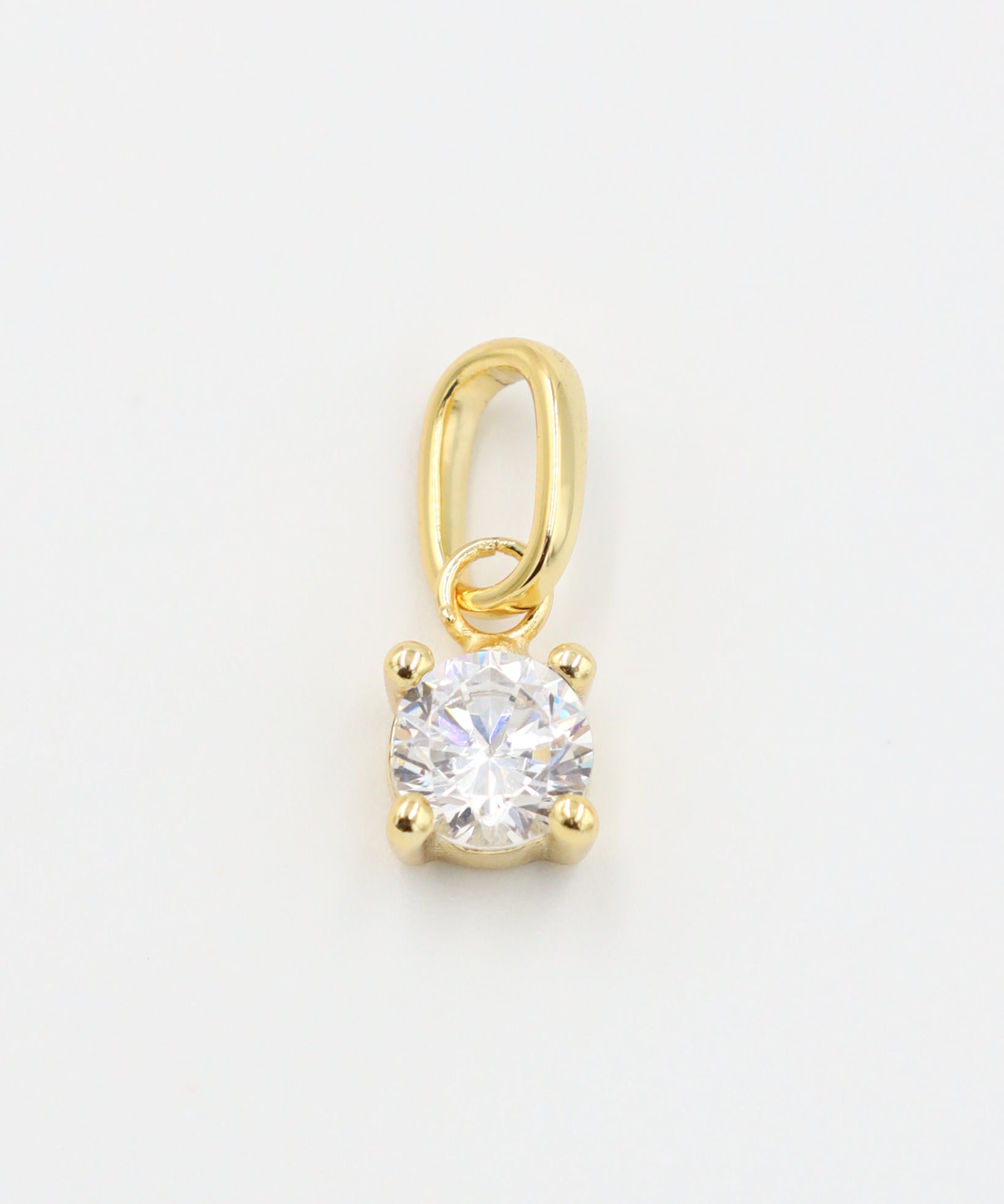 Close-up of Riley Gold Pendant with a zirconia stone set in gold-plated 925 sterling silver.