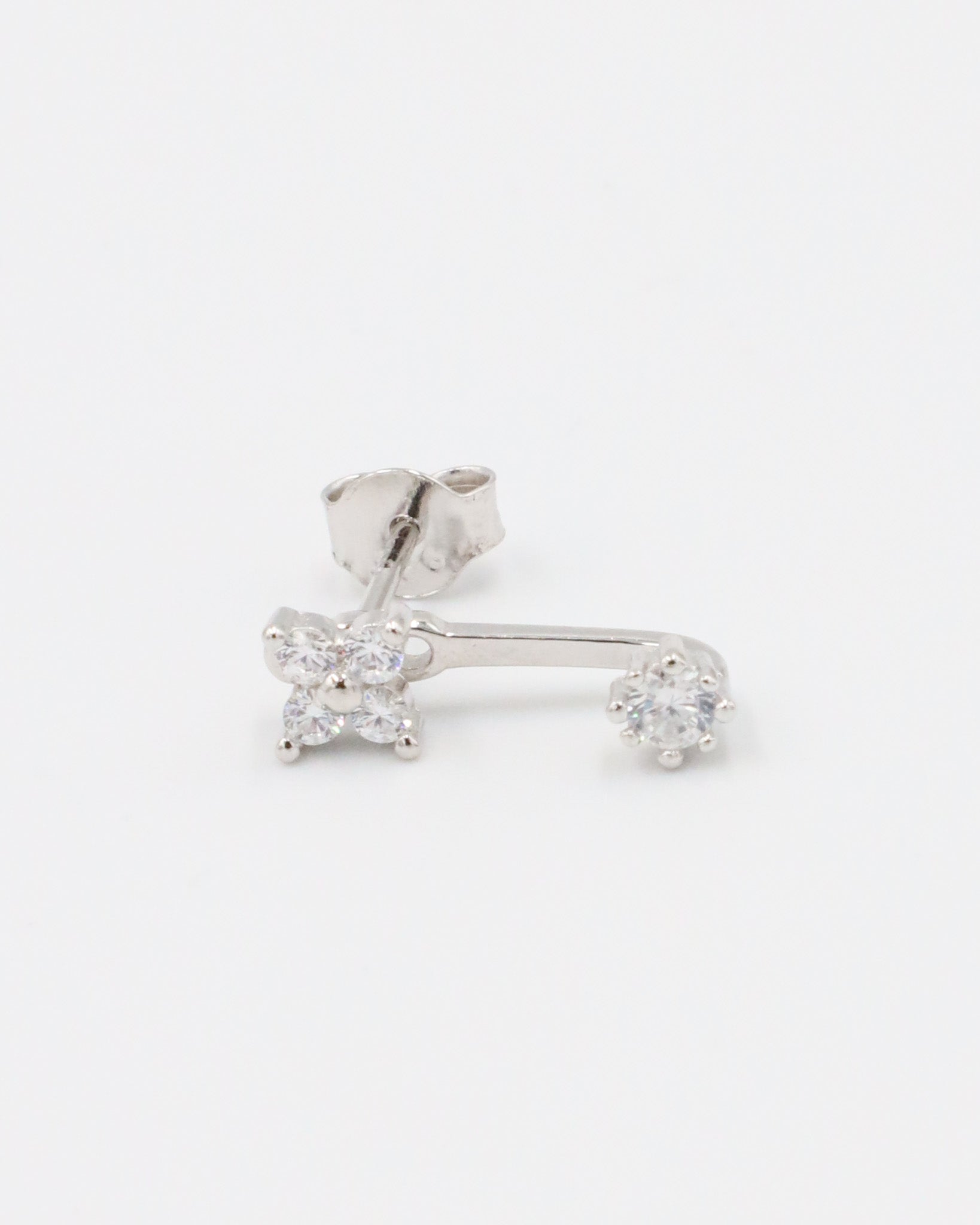 Sterling silver stud earring for the right ear with zirconia stones and a minimalist design.