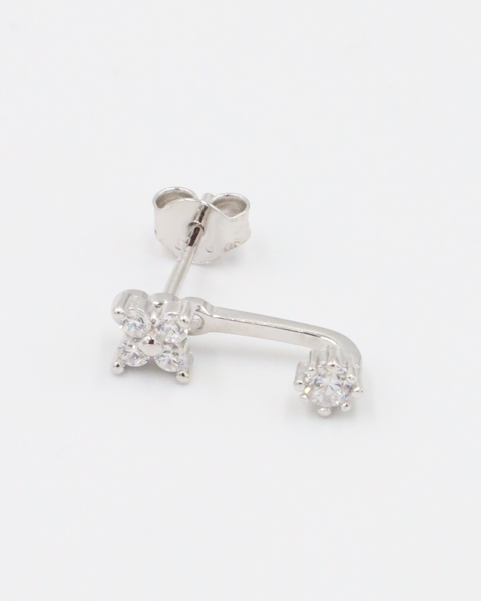 Sterling silver stud earring for the left ear with sparkling zirconia stones.