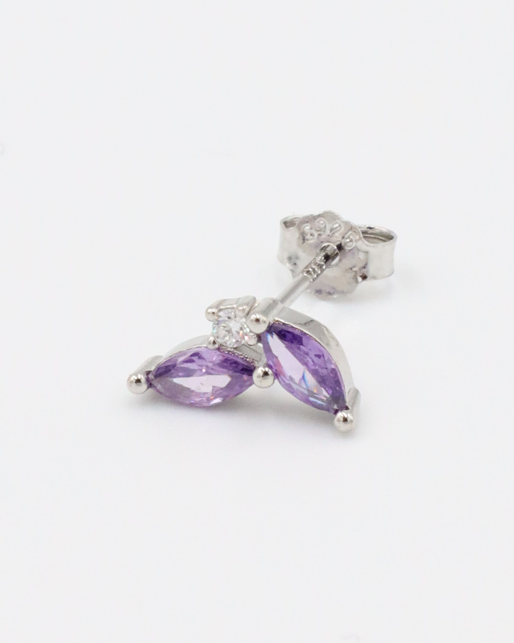 Sterling silver Eliza Purple Silver stud earring with marquise-cut purple zirconia and cubic zirconia accent, designed for the left ear.