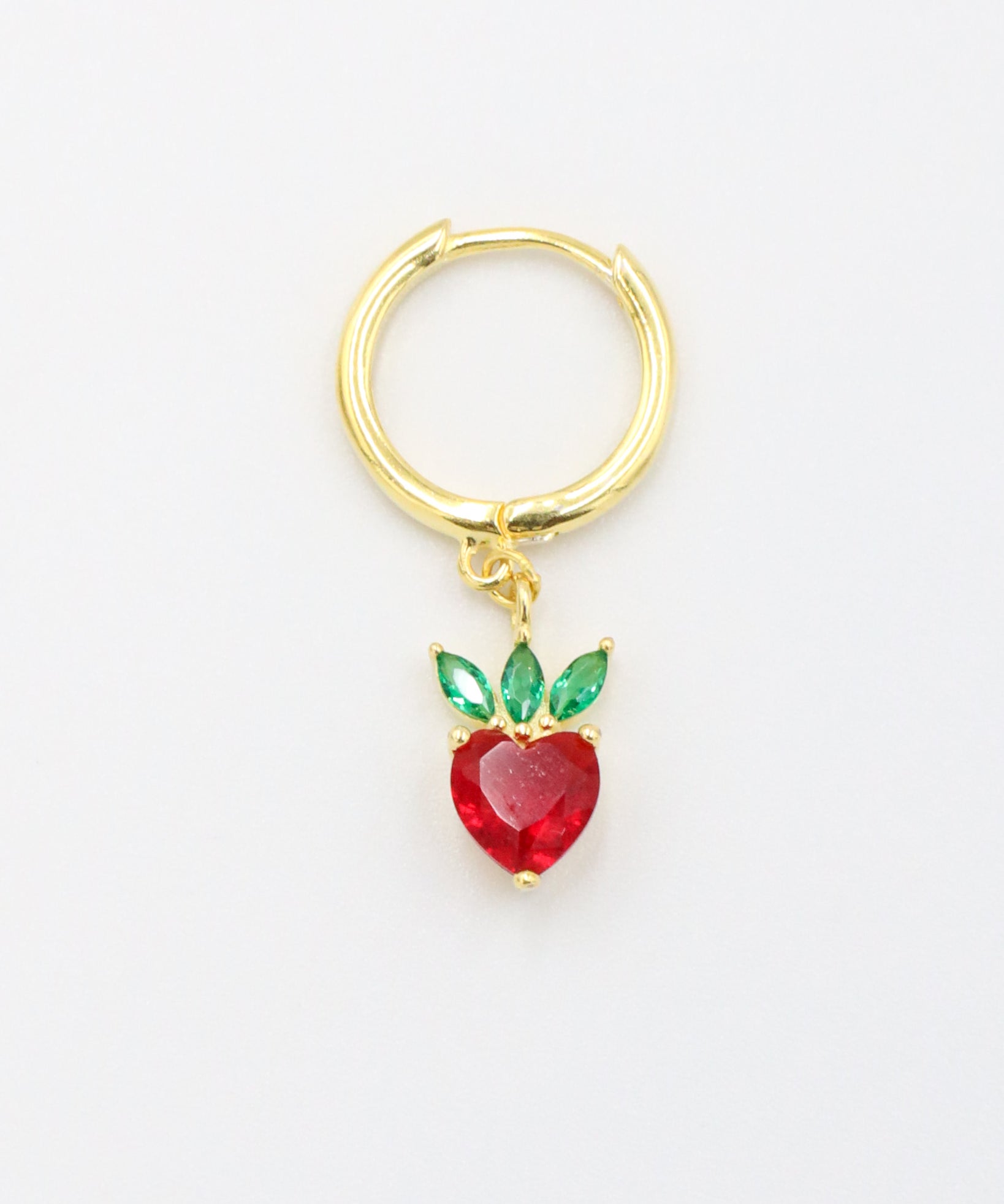 A single gold-plated sterling silver earring with a red heart-shaped zirconia stone and green leaf-shaped zirconia accents.