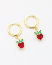 A pair of gold-plated sterling silver earrings featuring vibrant red heart-shaped zirconia stones with green leaf-shaped zirconia accents.