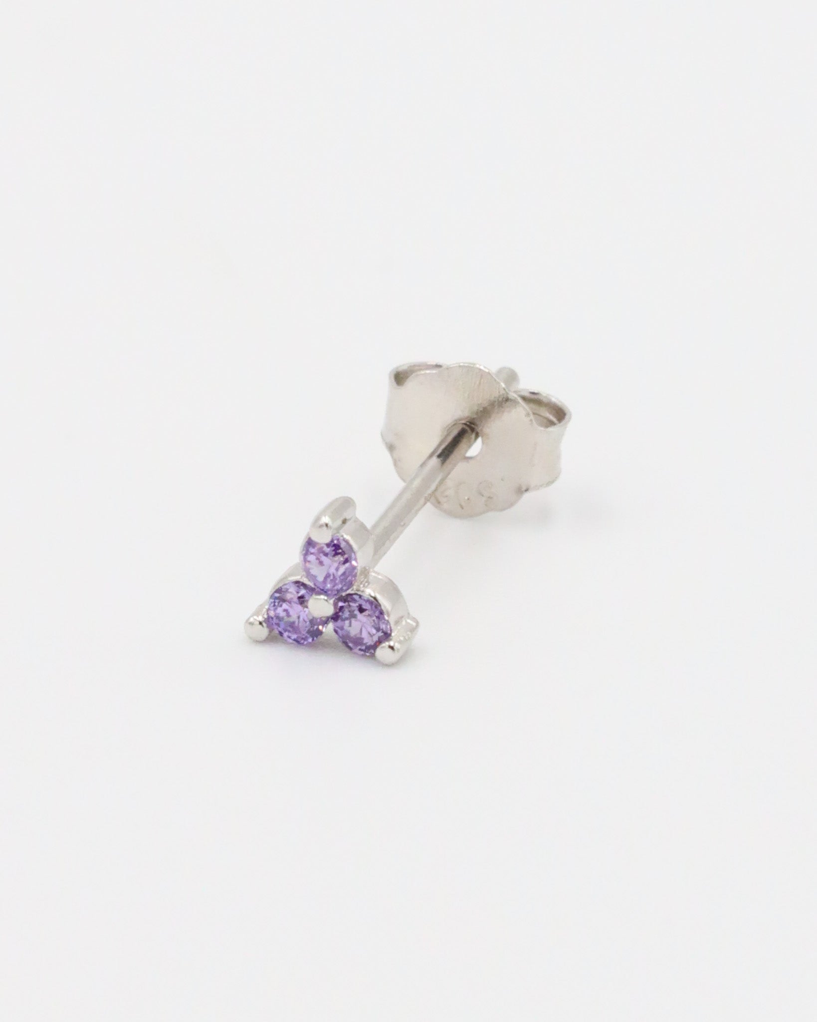 A single Vivian Lavender stud earring in sterling silver, adorned with three lavender zirconia stones.