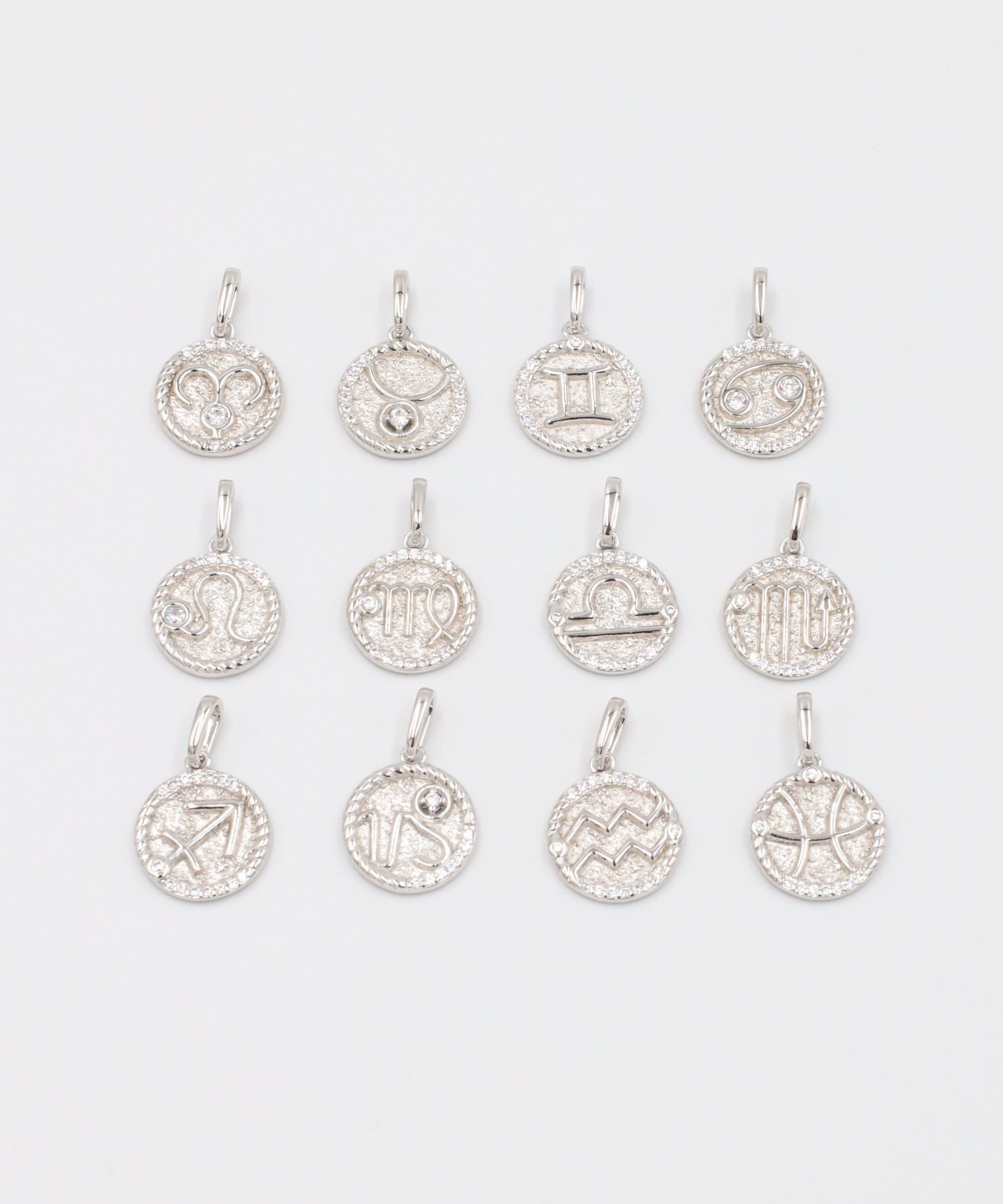 Rhodium Plated 925 Sterling Silver Zodiac Pendants with Zirconia Stones for All 12 Signs.