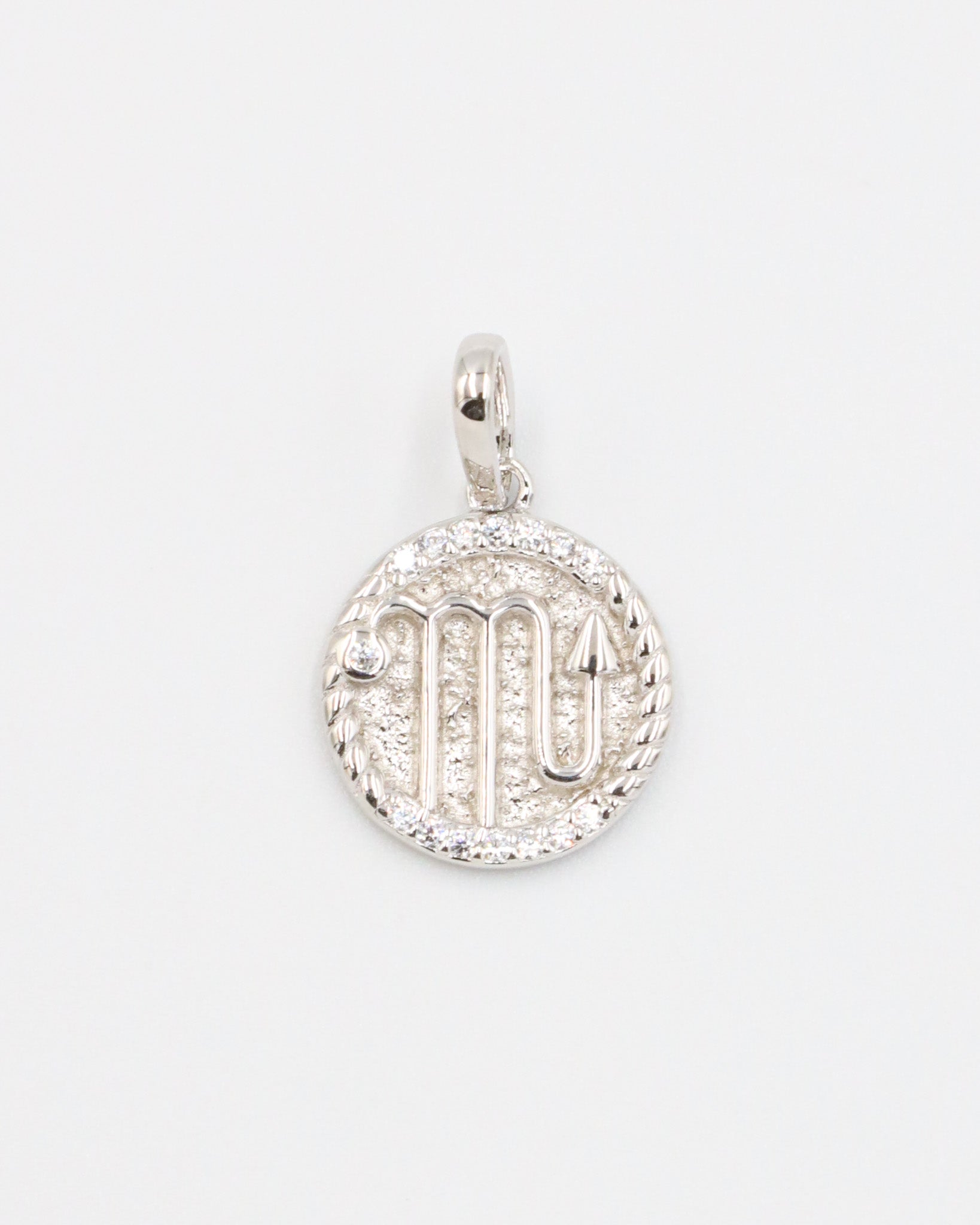 Scorpio zodiac silver pendant in rhodium-plated sterling silver with sparkling zirconia accents.